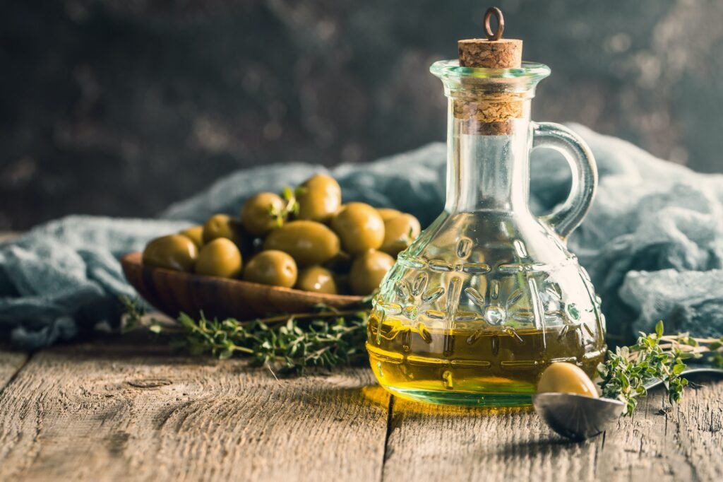 Olive oil and bowl of olives