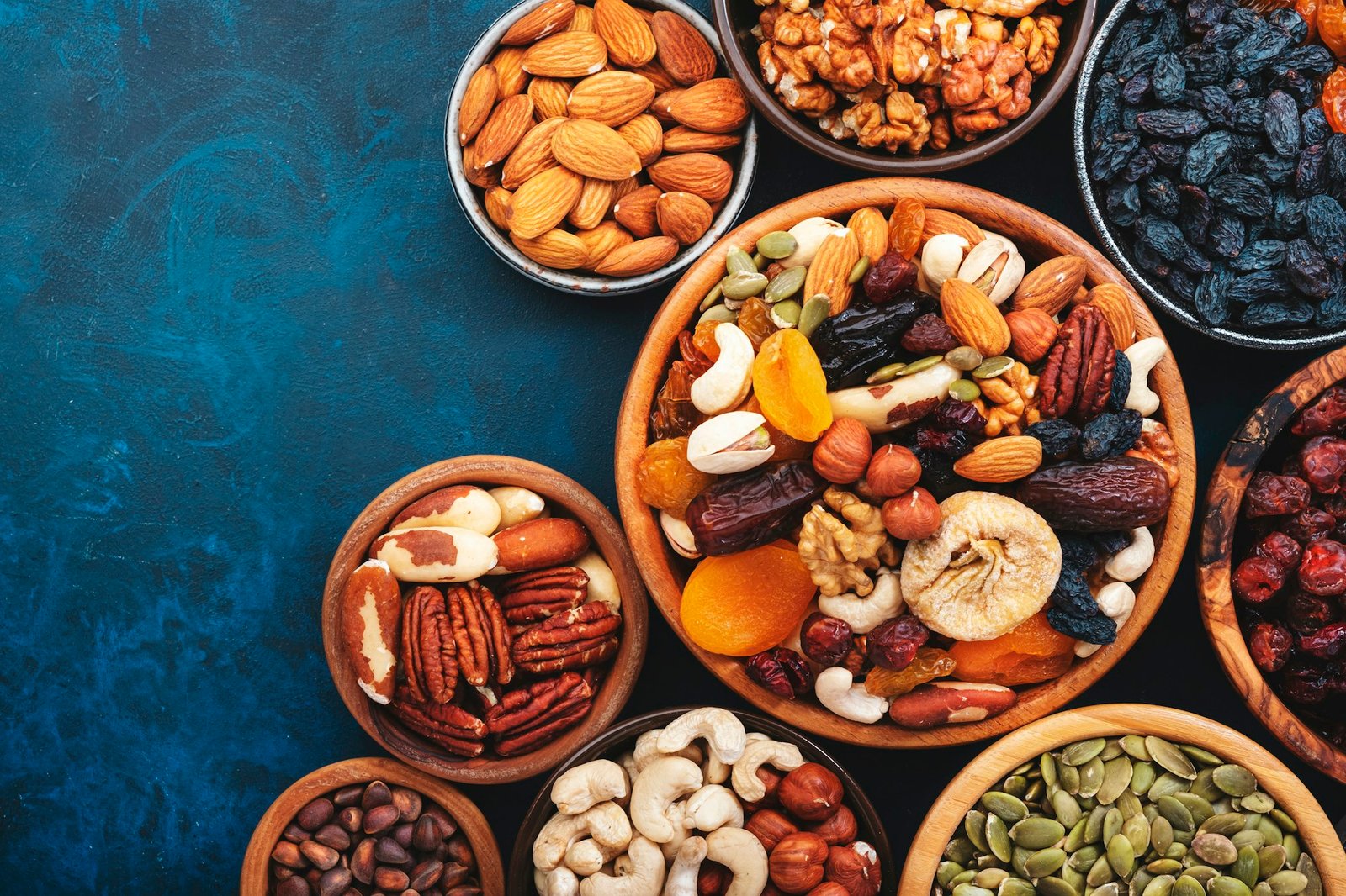 Nuts and dried fruits in assortment. Dry apricots, figs, raisins, walnuts, almonds